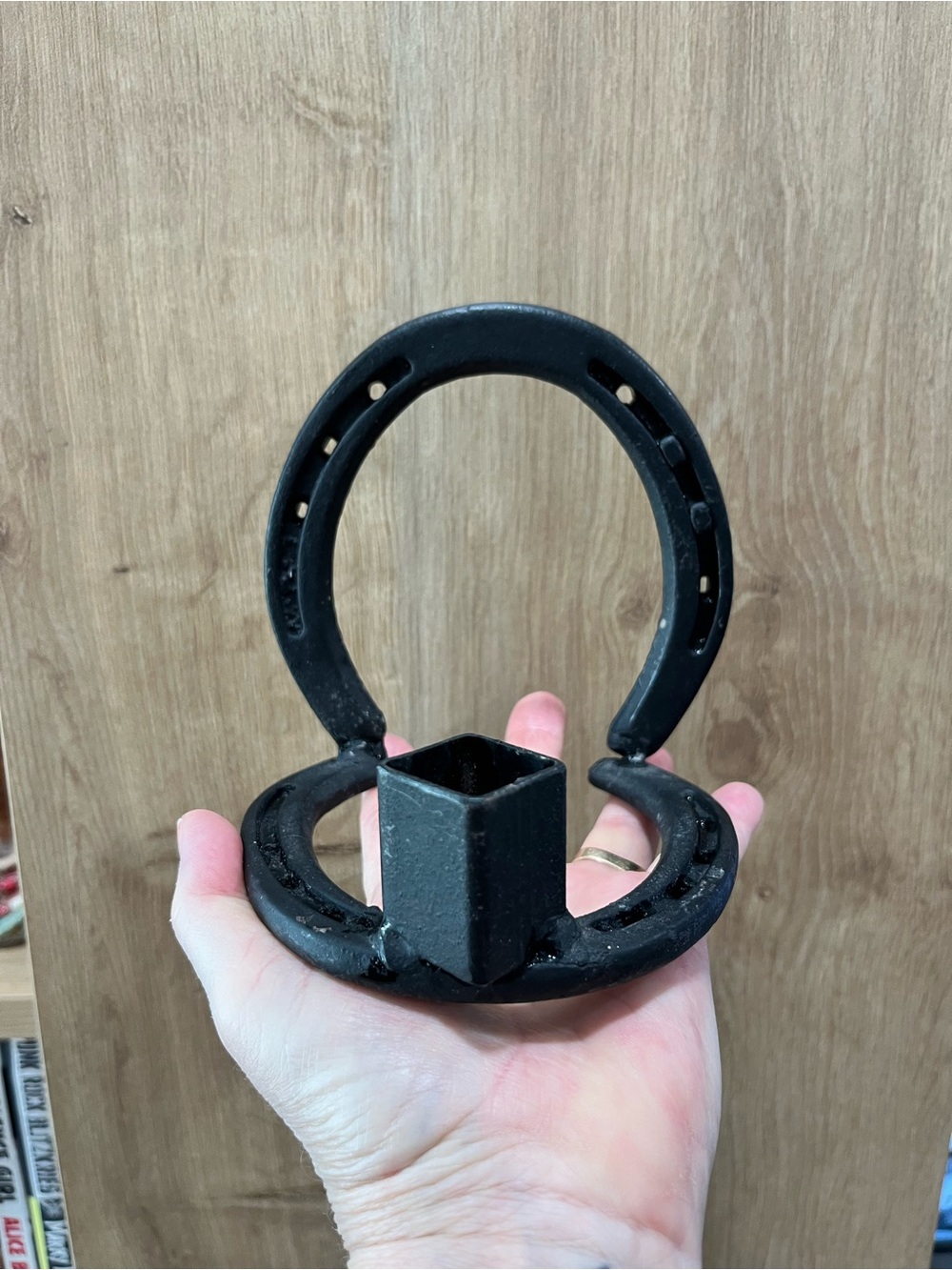 Rustic metal horseshoe candle holder